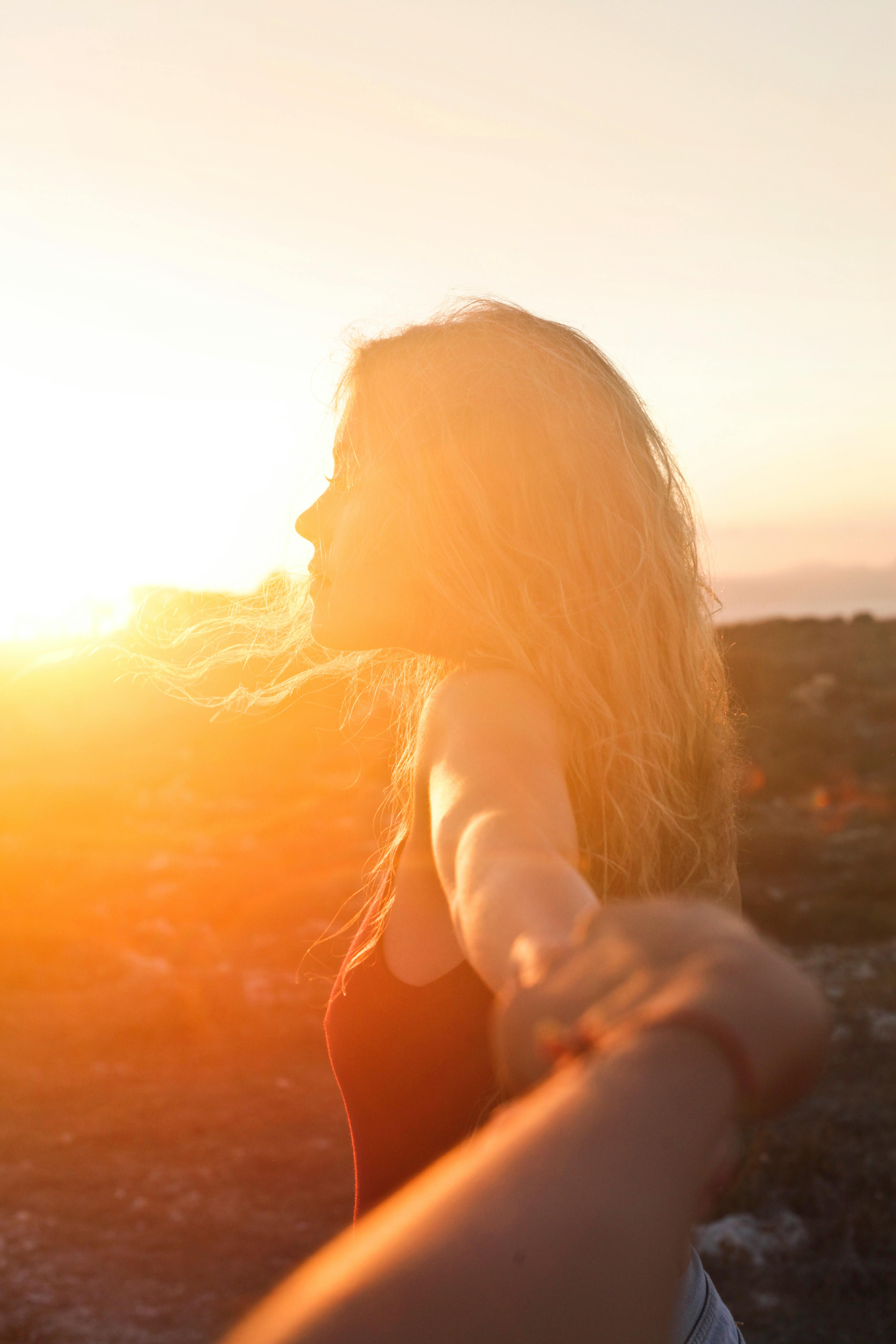 woman in the sun, sunset