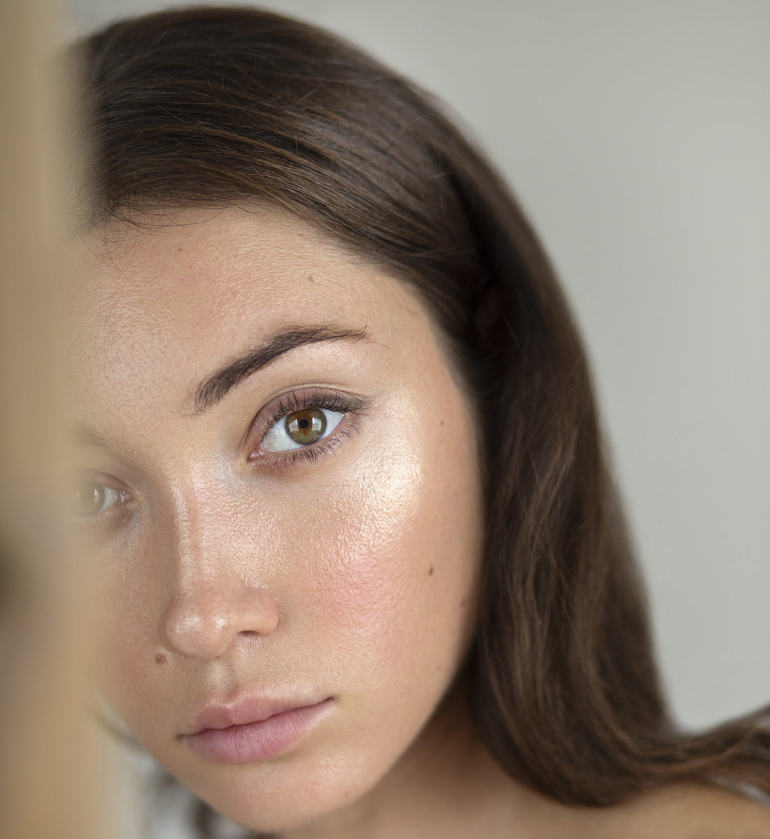 young woman at mirror