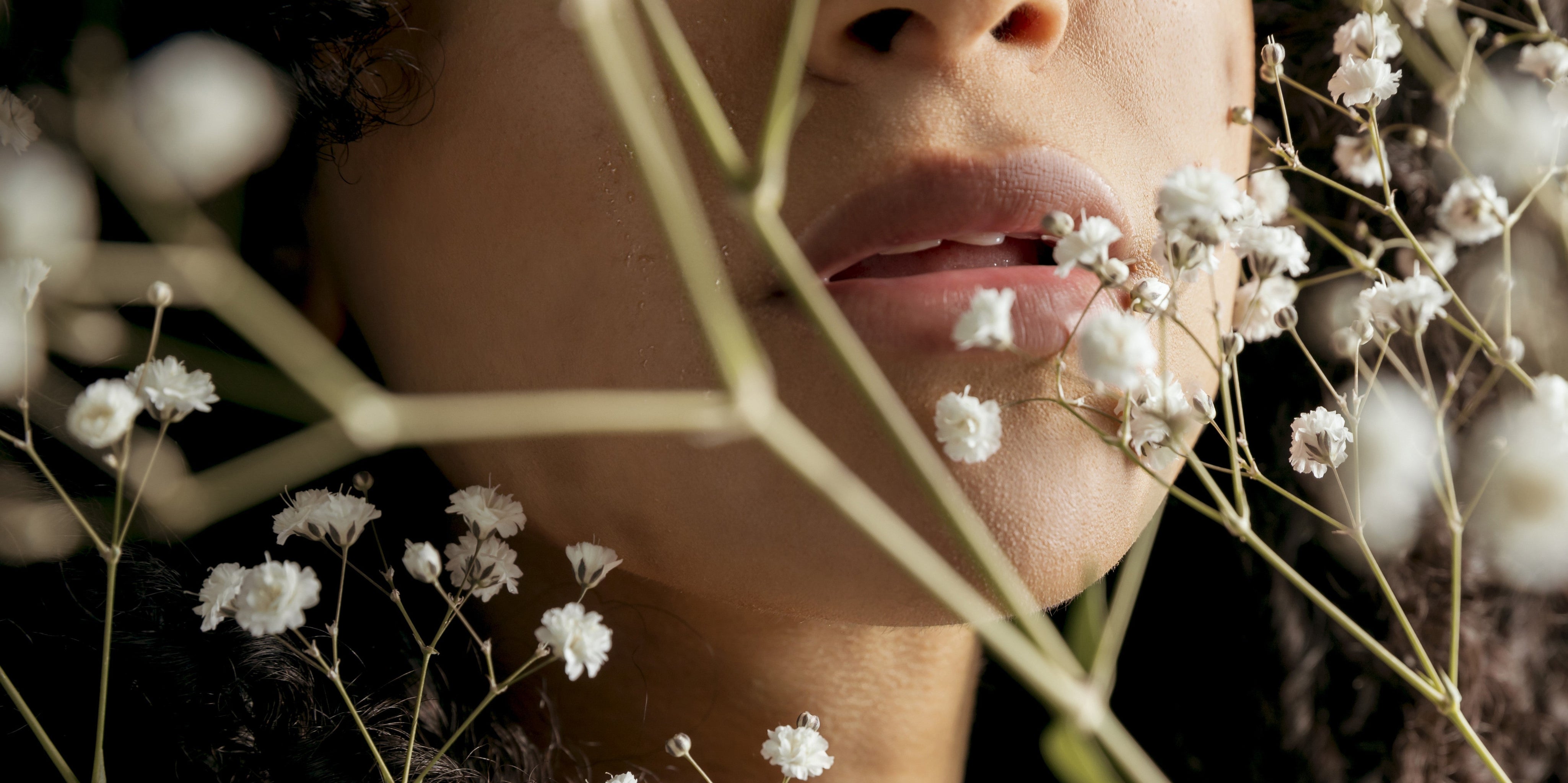 alluring-woman-flower-twigs.jpg